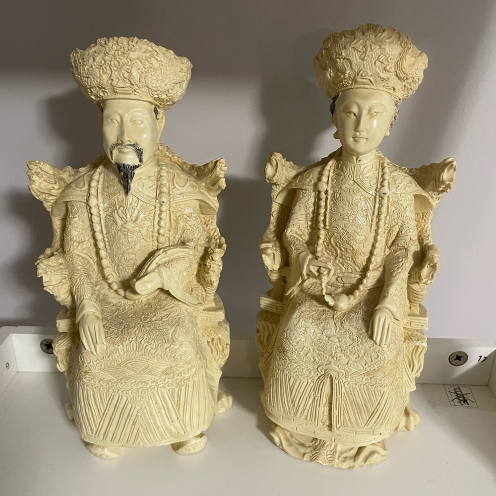 Vintage emperor and empress sculptures